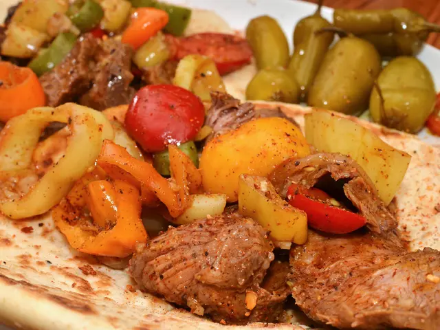 Maintain a clean and sanitized kitchen environment while cooking meals for safety and health.