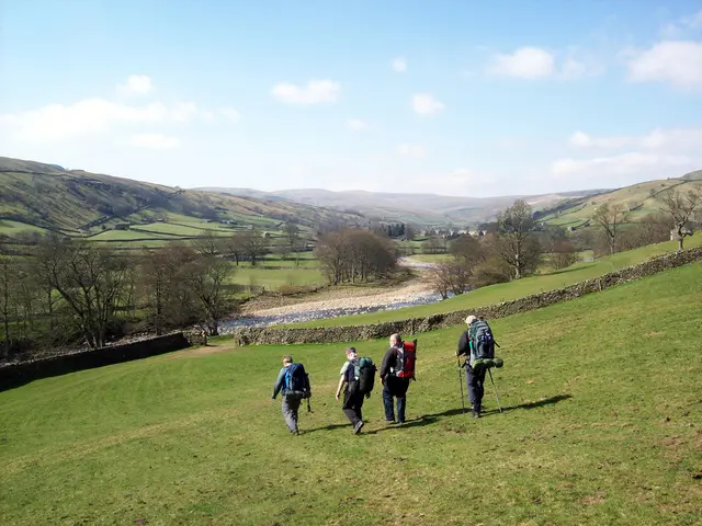 Hikers embark on trail adventures to support the Macmillan cancer charity, with sports equipment...